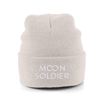 Beige soft cotton beanie featuring the Moon Soldier logo in white, designed for casual and cozy wear.